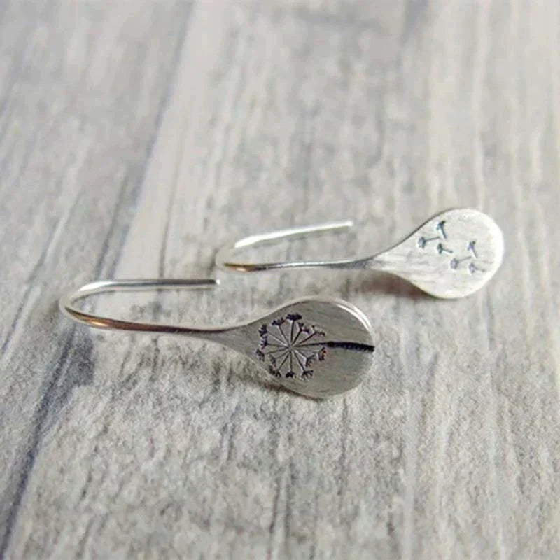 Boucles d'oreilles vintage en argent avec fleurs