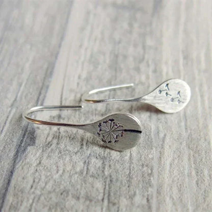 Boucles d'oreilles vintage en argent avec fleurs